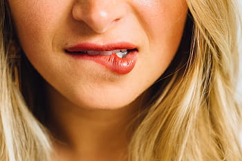 Image result for girl biting her bottom lip
