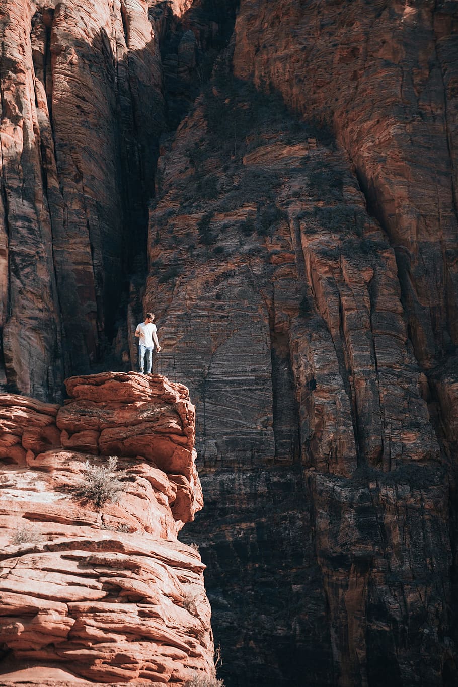 young, caucasian man, standing, layered, rock, grand, 25-30 year old, Adventure, America, Canyon