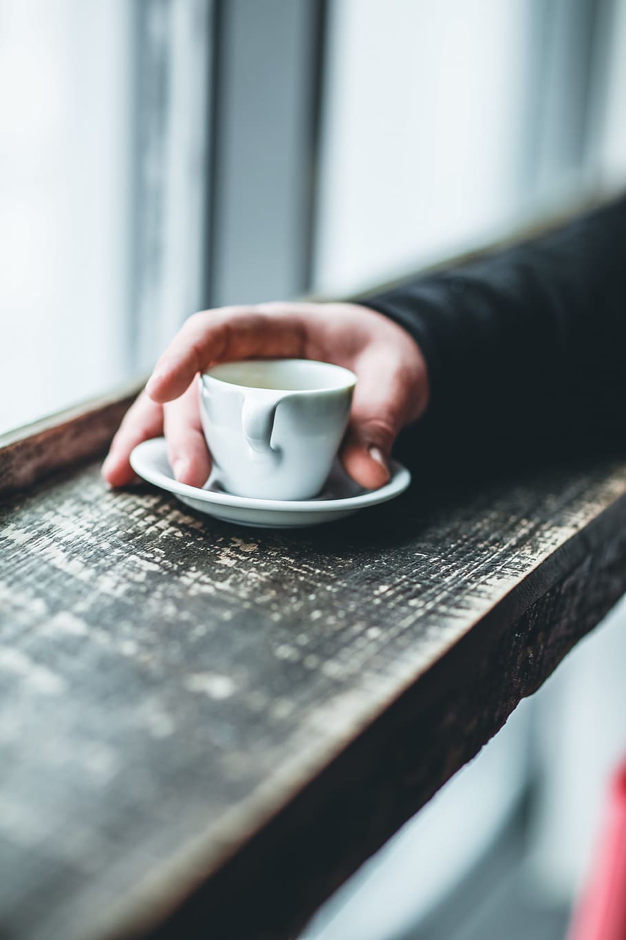 man, holding, espresso, coffee, cup, saucer, window, ledge, wood, drink