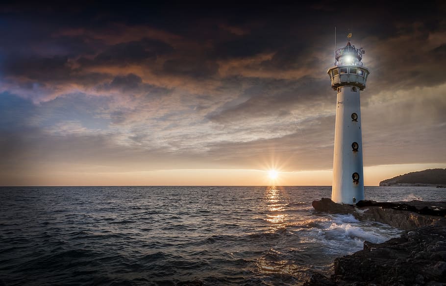 lighthouse, glow, evening, sunset, ocean, sea, horizon, distant, atmospheric, darkness