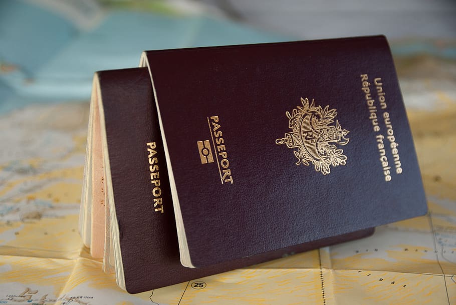 passport, border, customs, traveler, book, indoors, close-up, publication, text, focus on foreground