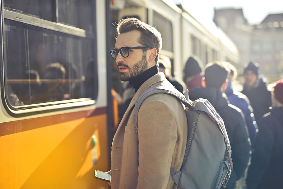 handsome, bearded, male, backpacker, backpack, shoulderswaiting, tram station, 30-35 years old, adult, boarding