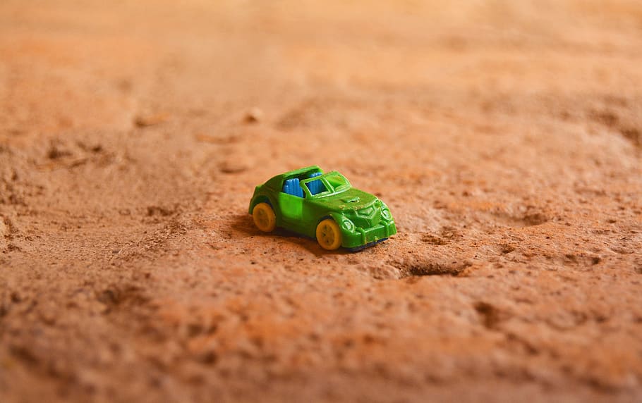 car, toy, fun, soil, green, plastic, selective focus, toy car, green color, environment