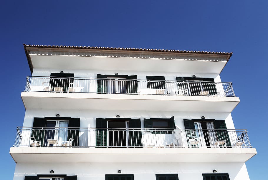 white, house, apartment, balcony, balconies, windows, shutters, railings, tables, chairs