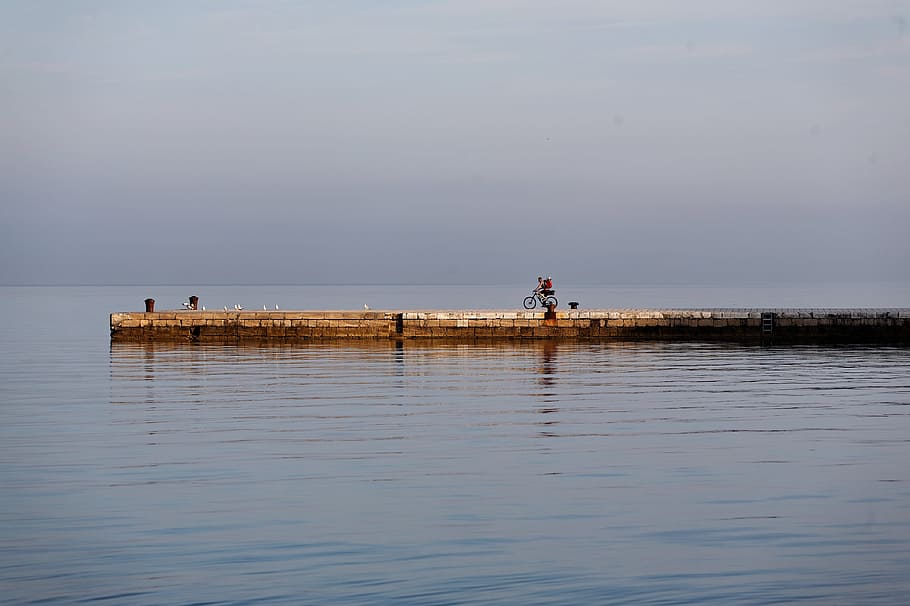 waterfront, dawn, pier, morning, sea, cyclist, bicycle, rider, riding, water