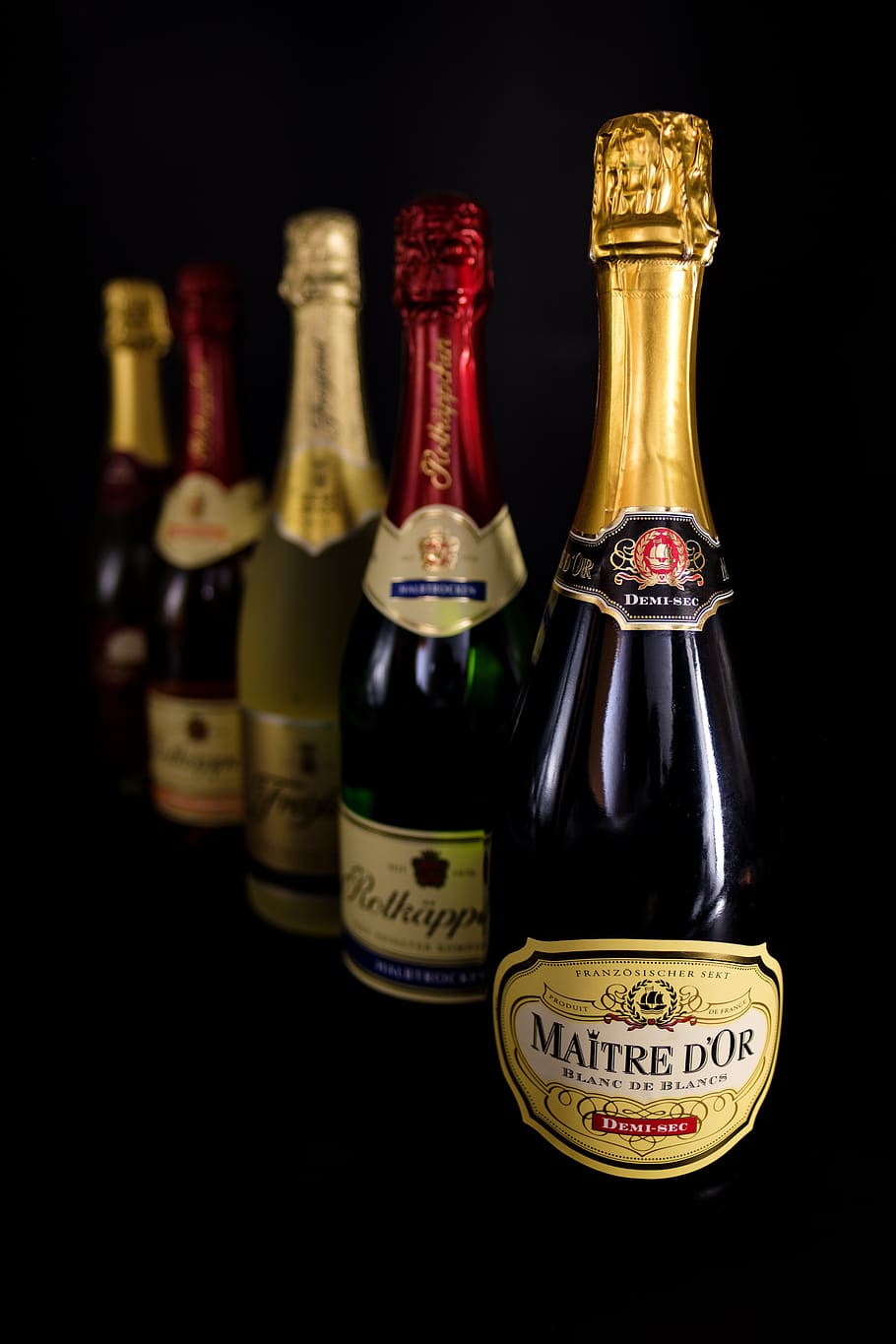 champagne, bottles, alcohol, drink, beverages, spirits, celebration, celebrate, text, bottle