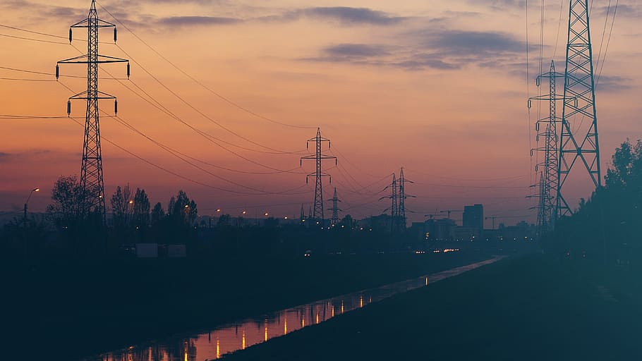 sunset, dusk, power lines, sky, clouds, city, river, water, trees, silhouette