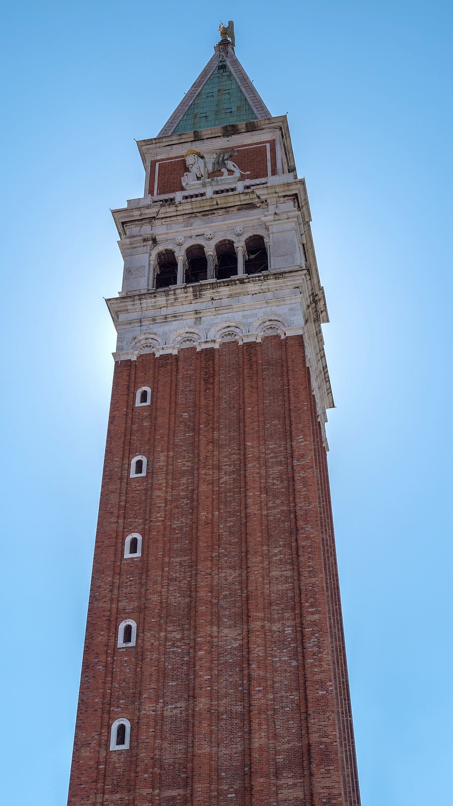 the bell tower of san marco venice, venice, italy, piazza san marco venice, low angle view, tower, architecture, building exterior, built structure, sky