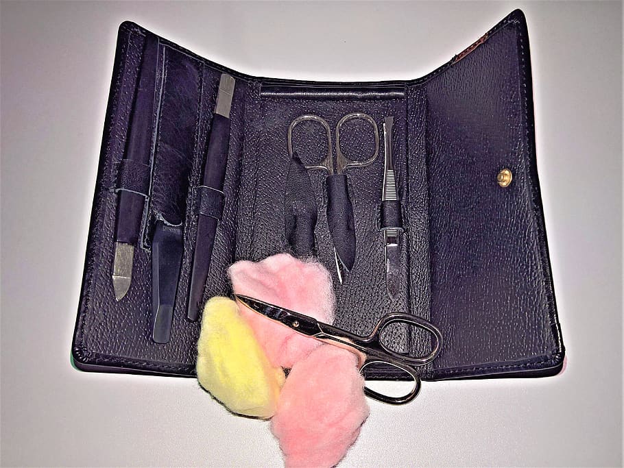 nail case, manicure, pedicure, leather case, a variety of scissors, file, tweezers, tools, nails, cosmetics